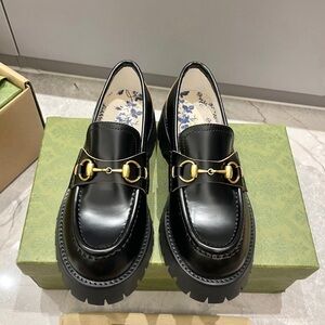 Gucci Black Loafers with Gold Accent
